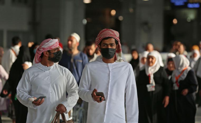 Muslim pilgrims wear masks at the Grand Mosque in Saudi Arabia's holy city of Mecca