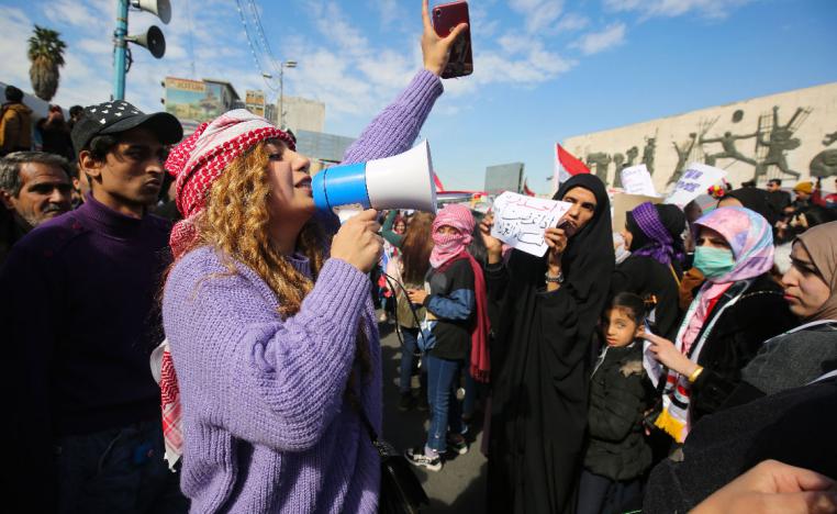 Iraqi women take to the streets in an anti-government demonstration in the capital's Tahrir Square