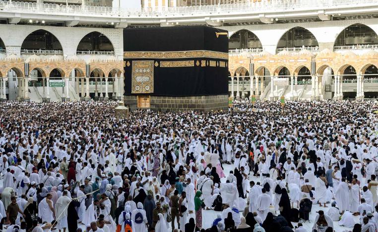 Muslim pilgrims performing the Tawaf al-Ifada at the Grand Mosque in Mecca