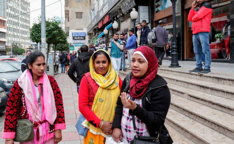 Djasmie Begon (R), a 32-year-old domestic worker from Bangladesh is pictured during an interview in the Lebanese capital Beirut