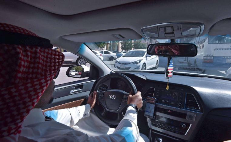 Like tens of thousands of Saudis looking to make extra money, 31-year-old Ahmed turned to the global giant Uber