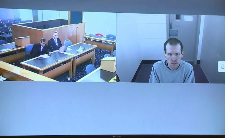 Brenton Harrison Tarrant, right, and lawyers in a screen via video link in Christchurch, New Zealand