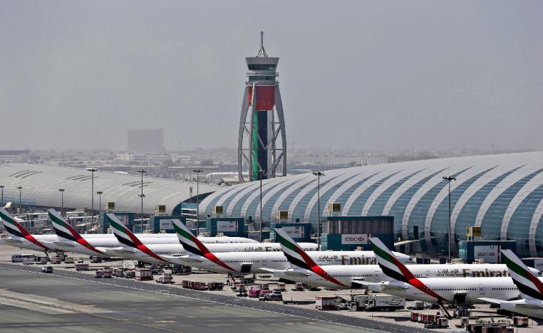 Emirates planes parked at the Dubai International Airport