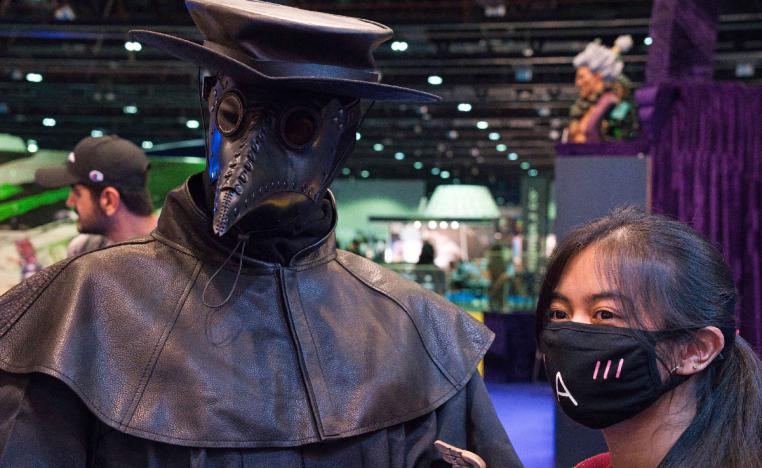 A cosplayer dressed as a plague doctor poses at the Middle East Film & Comic Con in Dubai
