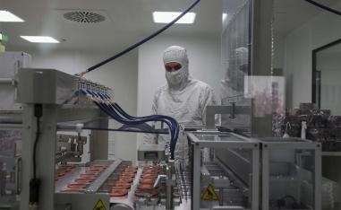A worker oversees the production of coronavirus testing kits in Gebze, northwestern Turkey,