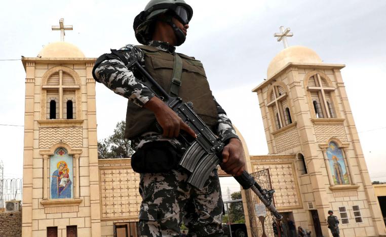 A member of Egypt's special police forces guards a Coptic church