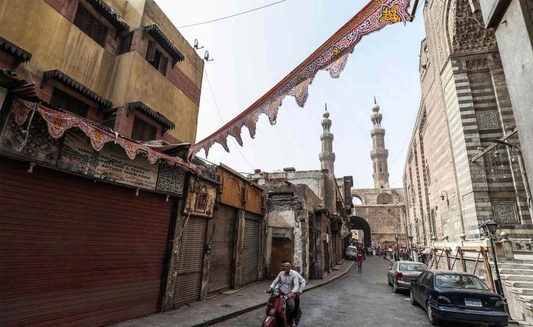  View of the area around Bab Zuweila (background), one of the remaining gates in the walls of the old medieval city of Egypt's capital Cairo