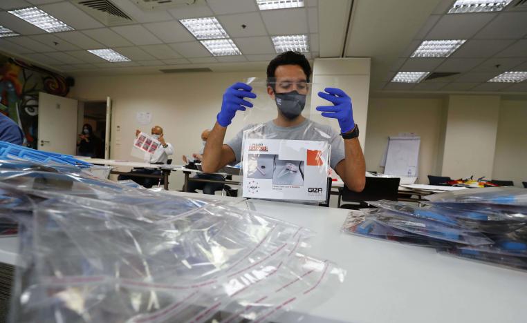 The firm is now distributing around 2,000 face shields a day to medics nationwide