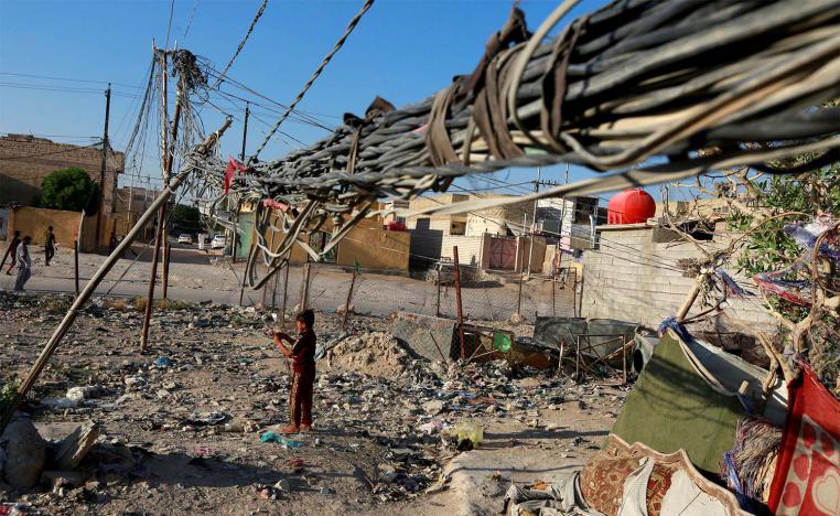 A view of the wire chaos of generator distribution of electricity in Najaf
