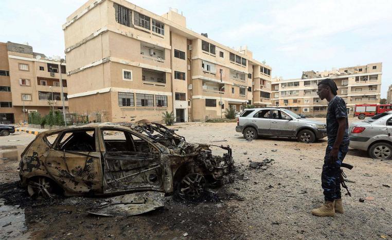 Destroyed car following bombardment in Tripoli