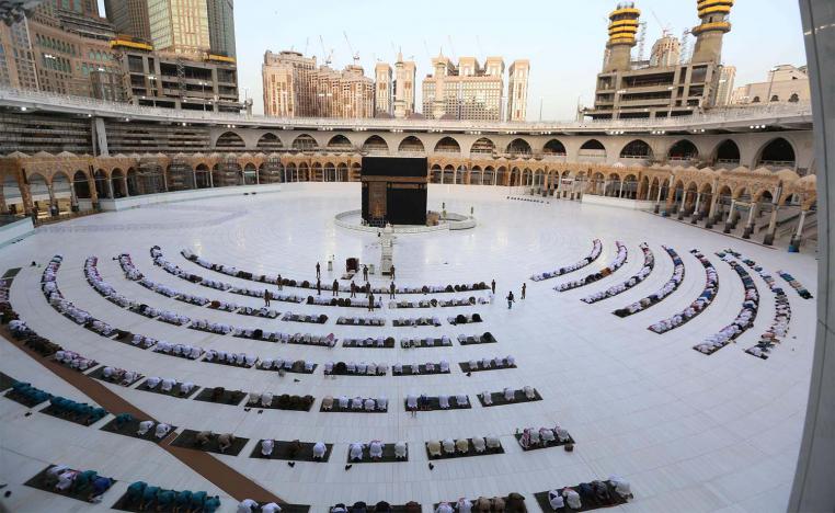 Worshippers gathering before the Kaaba at the Grand Mosque in Saudi Arabia's holy city of Mecca to attend the prayers of Eid al-Fitr