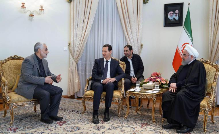 الرئيس الايراني حسن روحاني ونظيره السوري بشار الاسد