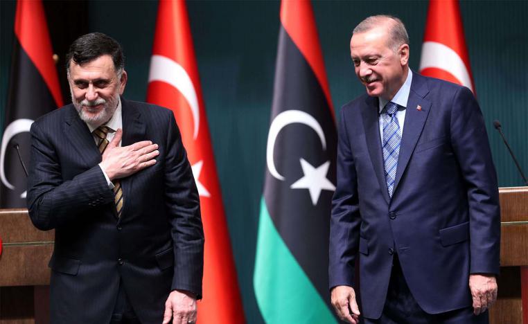 Turkish President Recep Tayyip Erdogan (R) and Libyan Prime Minister Fayez al-Sarraj (L) 