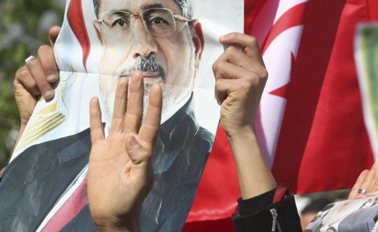 رفع صورة مرسي يستفز نواب البرلمان التونسي