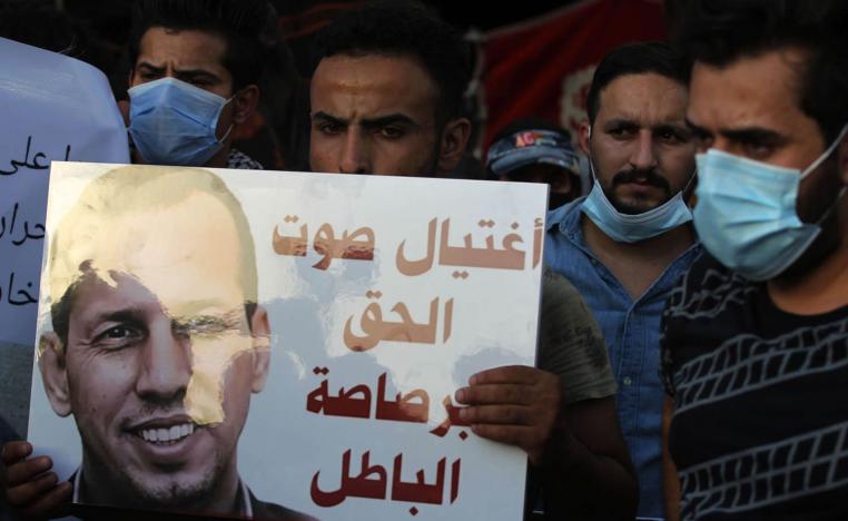 عراقيون يتظاهرون احتجاجا على اغتيال هاشم الهاشمي