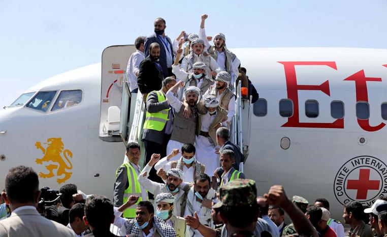 Freed Huthi prisoners arrive after their release in a prisoner swap, in Sanaa airport