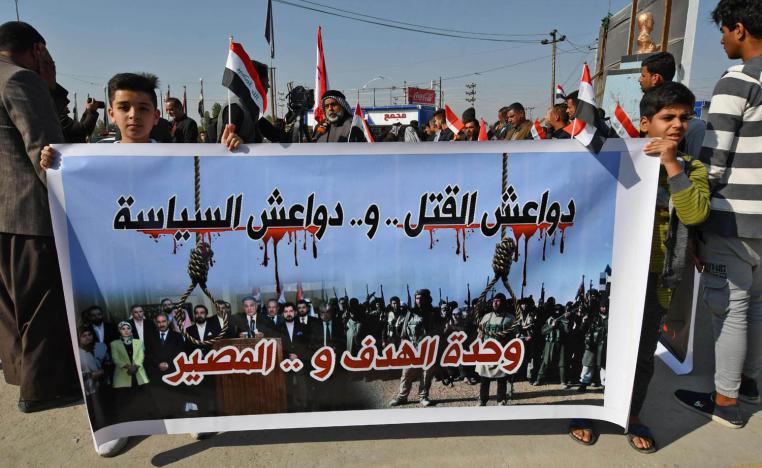 عراقيون يتظاهرون ضد منظومة الحكم