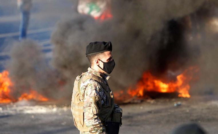 Demonstrators burnt tyres in Martyrs' Square in central Beirut