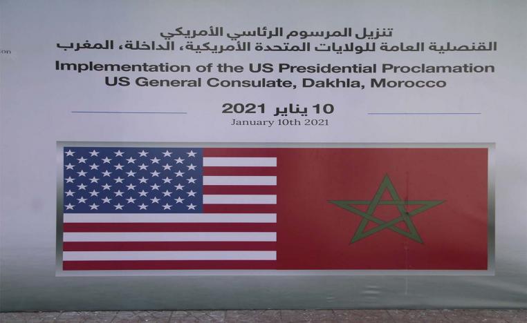 Moroccan and US flag emblems are seen outside the provisional consulate of the US in Dakhla