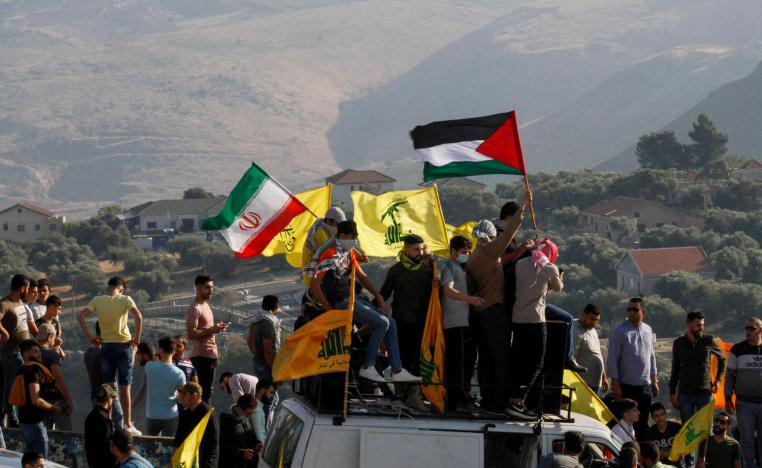 ناشطون من حزب الله على الحدود مع إسرائيل