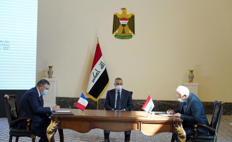 مراسم توقيع أضخم عقد في قطاع النفط بين توتال الفرنسية والعراق بحضور رئيس الوزراء مصطفى الكاظمي