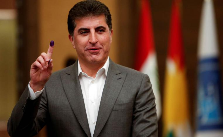 الرئيس الكردي نيجيرفان بارزاني خلال التصويت في انتخابات 2021