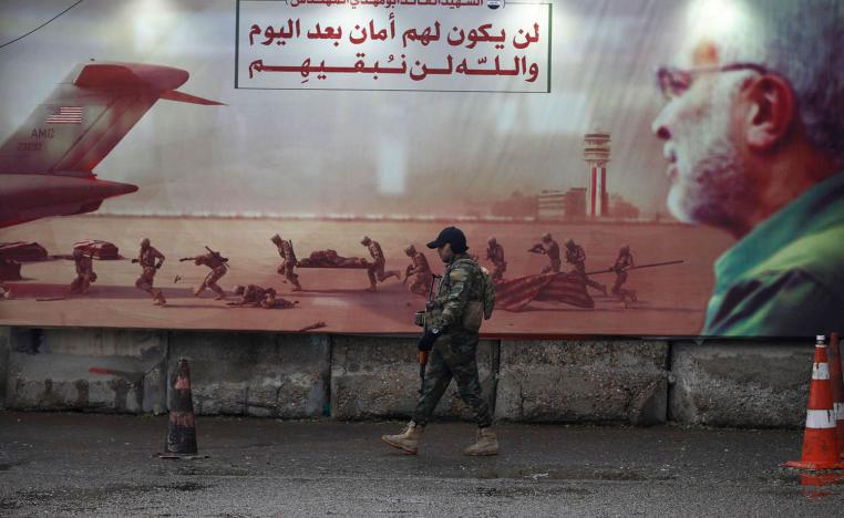 جدارية تحتفي بأحد قادة الحشد الشعبي في شوارع بغداد