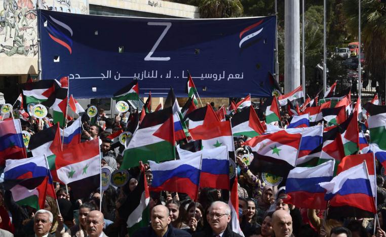 سوريون وفلسطينيون يتظاهرون دعما لروسيا في دمشق