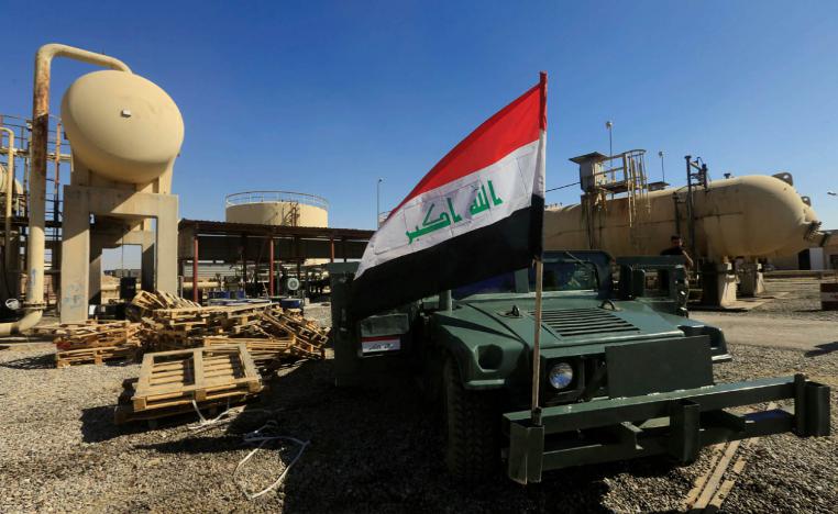 مدرعة عراقية تحرس منشآت نفطية في كركوك