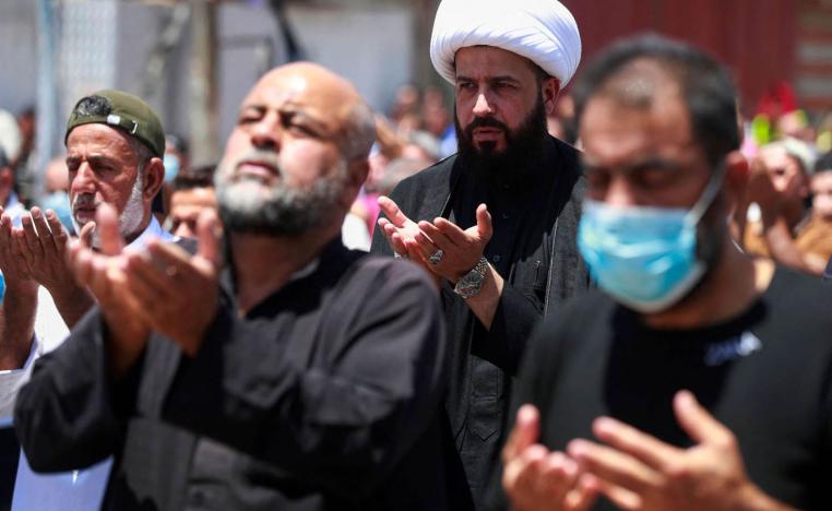 عراقيون في صلاة الجمعة في مدينة الصدر ببغداد