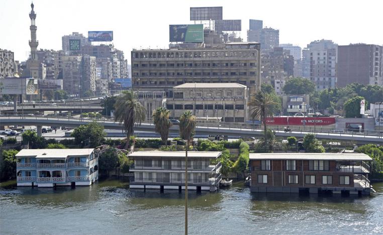 The floating homes are being removed or renovated to develop the waterfront commercially