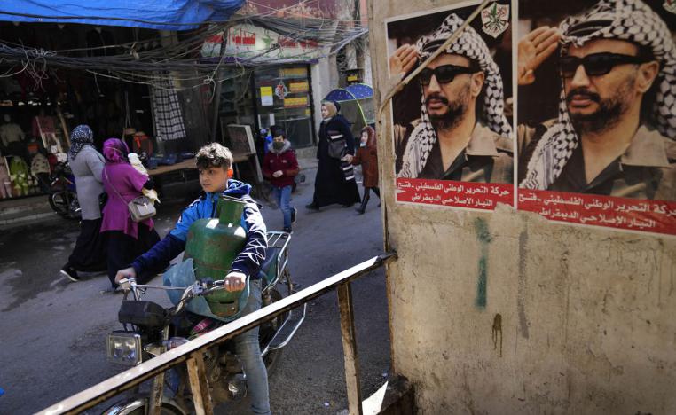 صور للزعيم الفلسطيني الراحل ياسر عرفات في مخيم برج البراجنة في بيروت