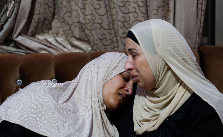 The mother of Palestinian Muhammad Al-Shaham in a state of shock