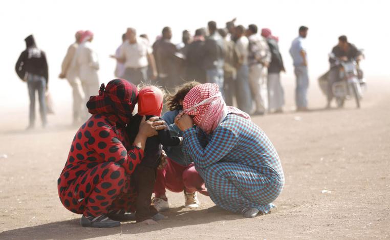 لاجئون أكراد من كوباني