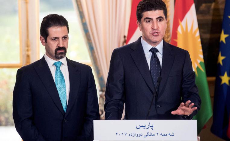 رئيس إقليم كردستان نيجيرفان بارزاني ونائب رئيس الوزراء في الإقليم قباد طالباني في مؤتمر صحفي في باريس