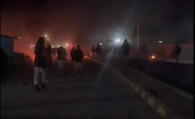 Live fire could be heard in videos posted on social media