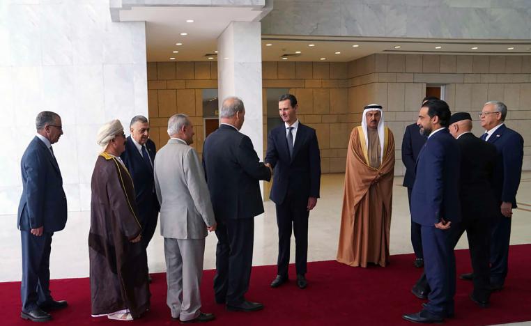 الأسد يستقبل رؤساء وفود البرلمانات العربية في قصر الشعب في أول زيارة من هذا النوع لدمشق منذ 2011