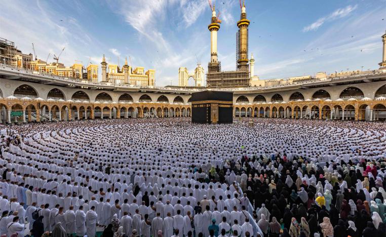 Muslim worshippers pray around the Kaaba, Islam's holiest shrine, at the Grand Mosque in Mecca