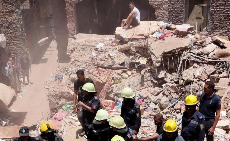 The rubble of a five-story apartment building that collapsed