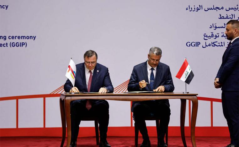 Iraqi Deputy Prime Minister for Energy Affairs and Minister of Oil, Hayan Abdul Ghani Al-Swad and Patrick Pouyanne, Chairman and CEO of TotalEnergies