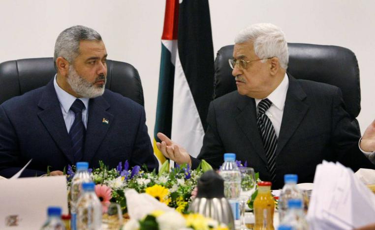 الرئيس الفلسطيني محمود عباس ورئيس حماس إسماعيل هنية