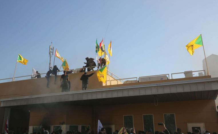 حزب الله العراقي قاد في السابق محاولة اقتحام واحراق أجزاء من السفارة الأميركية في بغداد