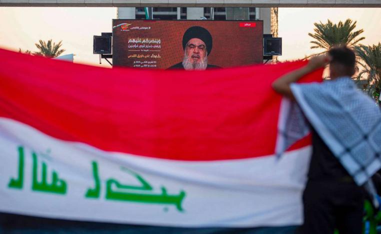 شاشة عملاقة في ساحة التحرير وسط بغداد تبث خطاب حسن نصرالله