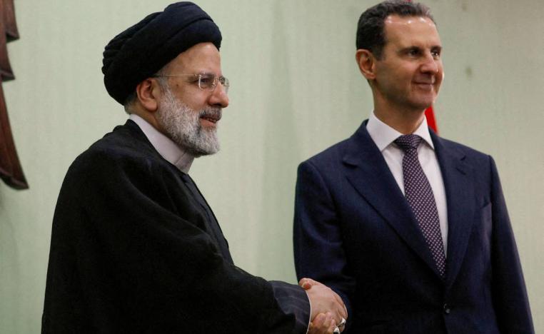 الرئيس الإيراني الراحل إبراهيم رئيسي في صورة أرشيفية مع الرئيس السوري بشار الأسد