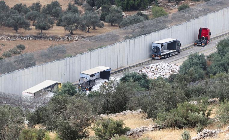 Israeli settlers attacked the trucks and they destroyed the products and set fire in trucks