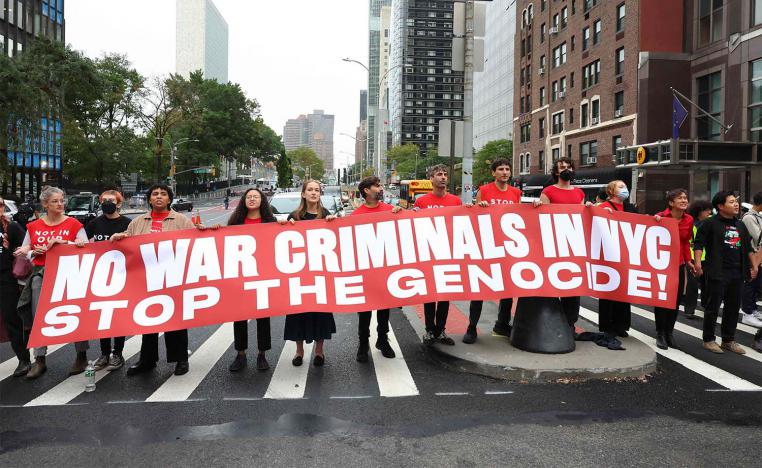 Pro-Palestinian protestors block traffic on First Avenue near the UN headquarters  in New York