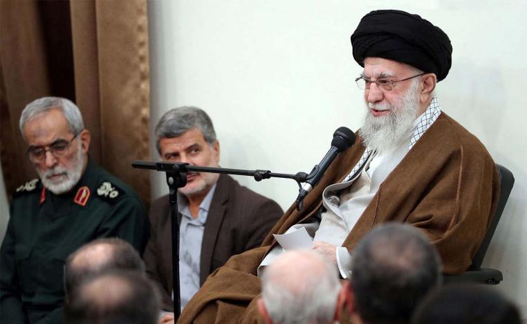 Iran's supreme leader (R) Ayatollah Ali Khamenei 