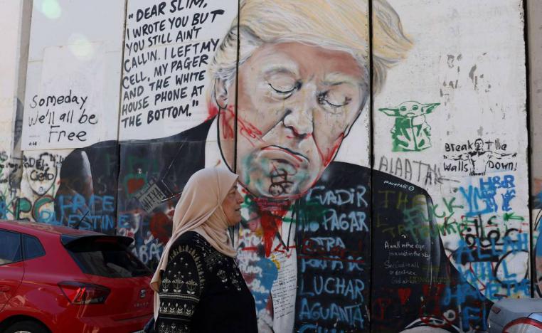 رسم لترامب على الجدار الفاصل بين الضفة الغربية واسرائيل