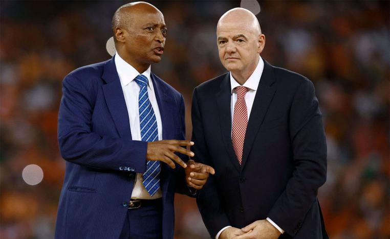 CAF President Patrice Motsepe (L)