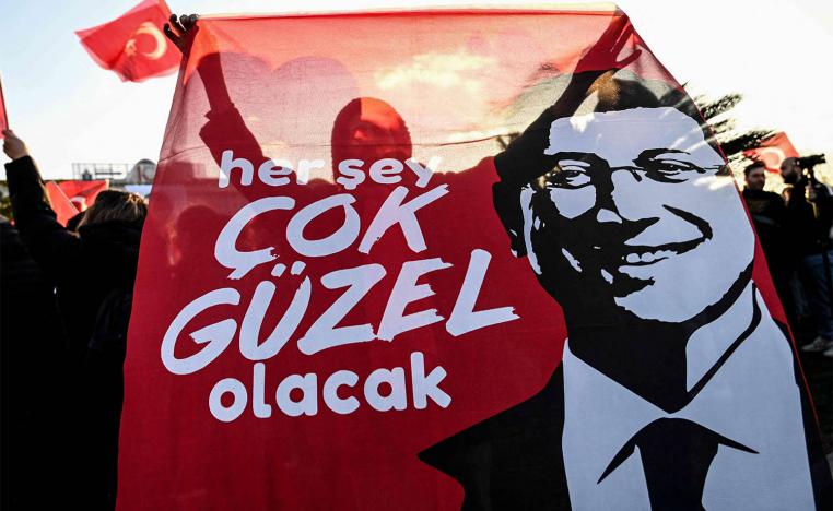 Supporters of Istanbul Mayor Ekrem Imamoglu take part in a demonstration outside Istanbul municipality against his detention over a corruption probe